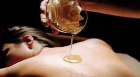 Massage bien-être aux huiles chaudes